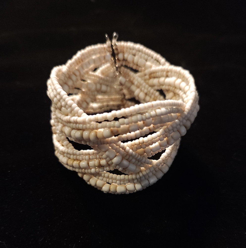 Intricate Cream Woven Bracelet with Vintage Appeal
